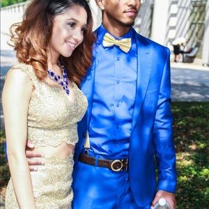 A gold two piece prom dress